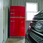 Red fridge in garage