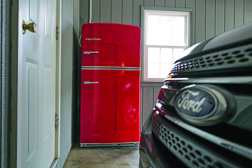Red fridge in garage