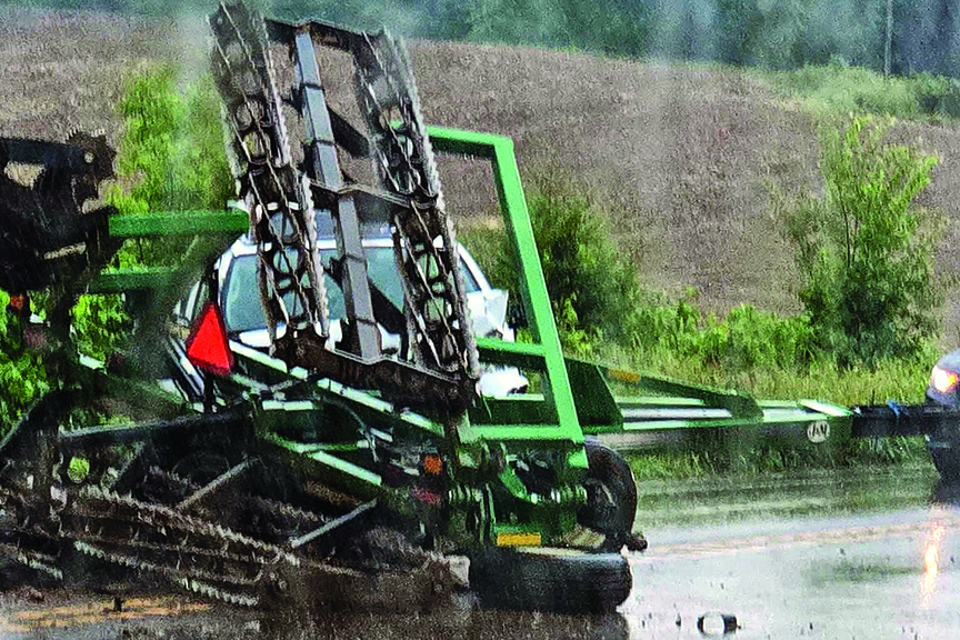 Scene from a crash between a motorist and a planter on a road in Orange County, Virginia.