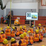 Utility worker leads safety program at a school