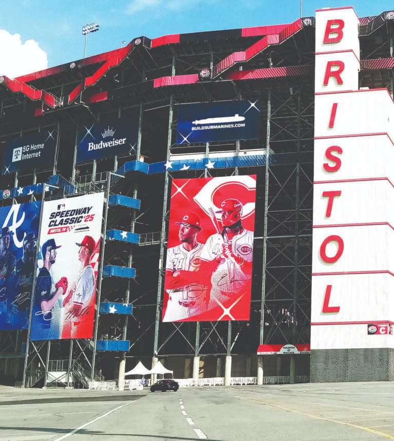 Large screens promote a baseball game at Bristol Motor Speedway