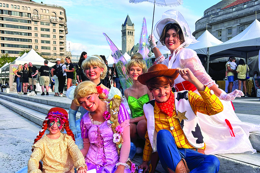 Volunteers pose as several popular characters from children's books and movies.