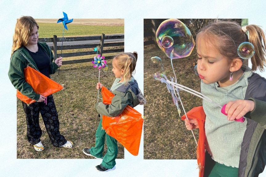Two girls with kites and pinwheels; girl blowing bubbles