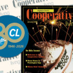 A graphic featuring a January 2000 cover of "Virginia's Electric Cooperative Living" magazine, which displays a frosted cake with burning sparkler candles and the text "WELCOME 2000." Overlaid on the left is a blue circular logo celebrating an 80th anniversary with the text "CL" and "1946–2026."